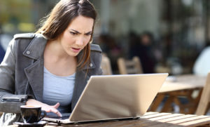 Concerned woman on computer